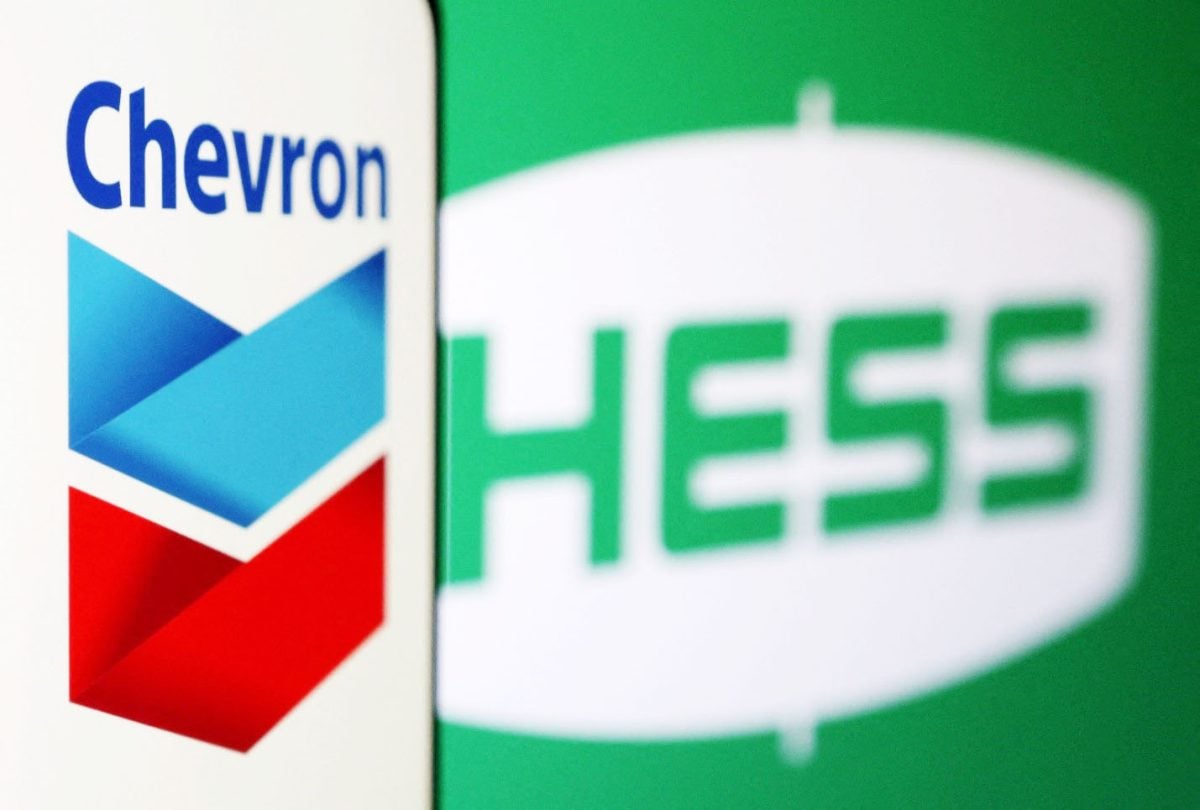 Chevron and Hess logos are seen in this illustration taken, October 23, 2023. REUTERS/Dado Ruvic/Illustration/File Photo 