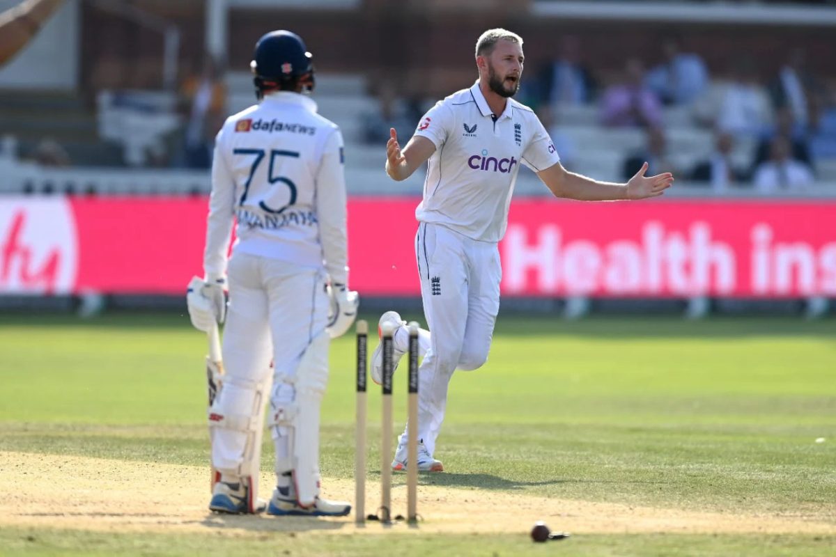 Gus Atkinson celebrates after bowling Sri Lanka’s Dhananjaya de Silva for 50
