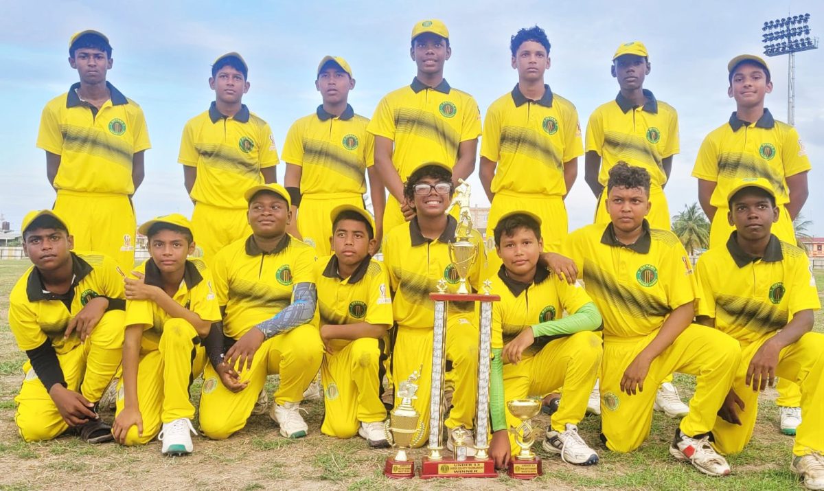 Dynasty! The victorious Essequibo side poses with their spoils of victory after retaining the GBC U-13 Inter-County 40-over title