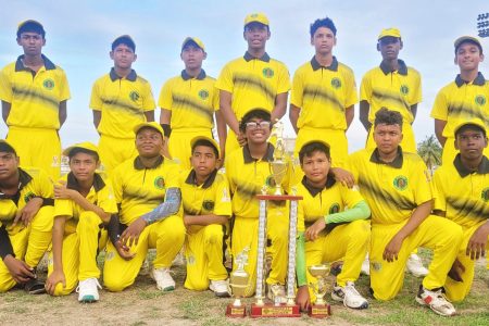 Dynasty! The victorious Essequibo side poses with their spoils of victory after retaining the GBC U-13 Inter-County 40-over title