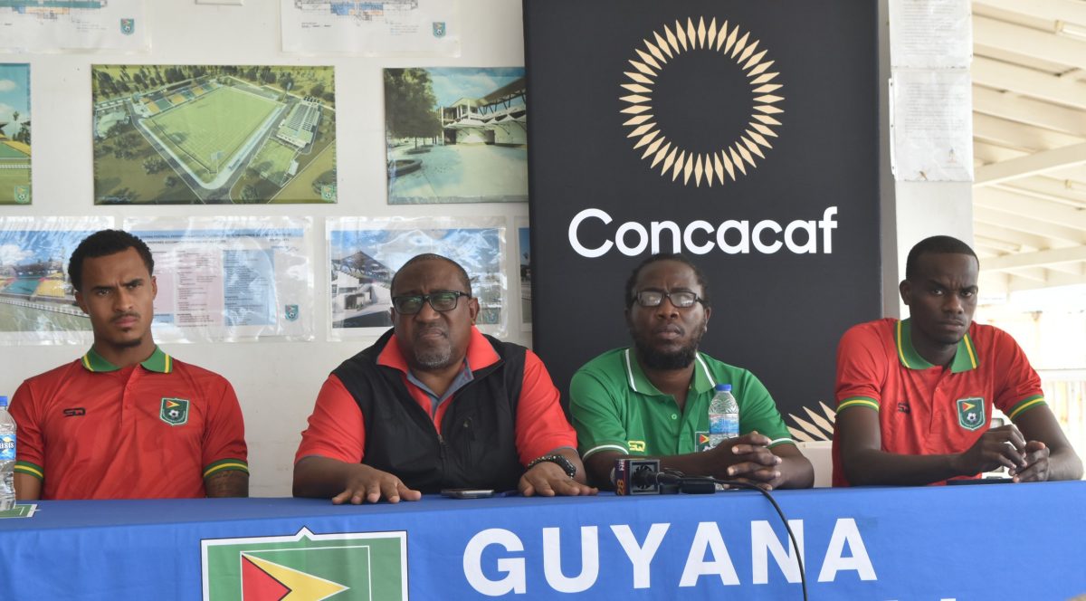 Golden Jaguars head coach Jamaal Shabazz (2nd from left) was about to make a point during the pre-match press conference yesterday. Also in the photo (from left) are Golden Jaguars international Elliot Bonds, assistant coach Wayne Dover, and Golden Jaguars international Daniel Wilson.