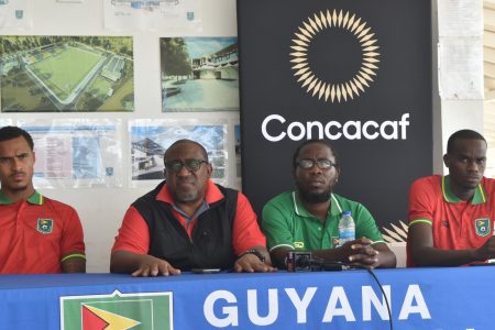 Golden Jaguars head coach Jamaal Shabazz (2nd from left) was about to make a point during the pre-match press conference yesterday. Also in the photo (from left) are Golden Jaguars international Elliot Bonds, assistant coach Wayne Dover, and Golden Jaguars international Daniel Wilson.