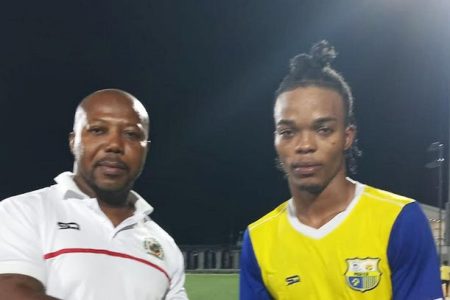 Pele’s Orlando Lovell (right) receives
the player of the match accolade