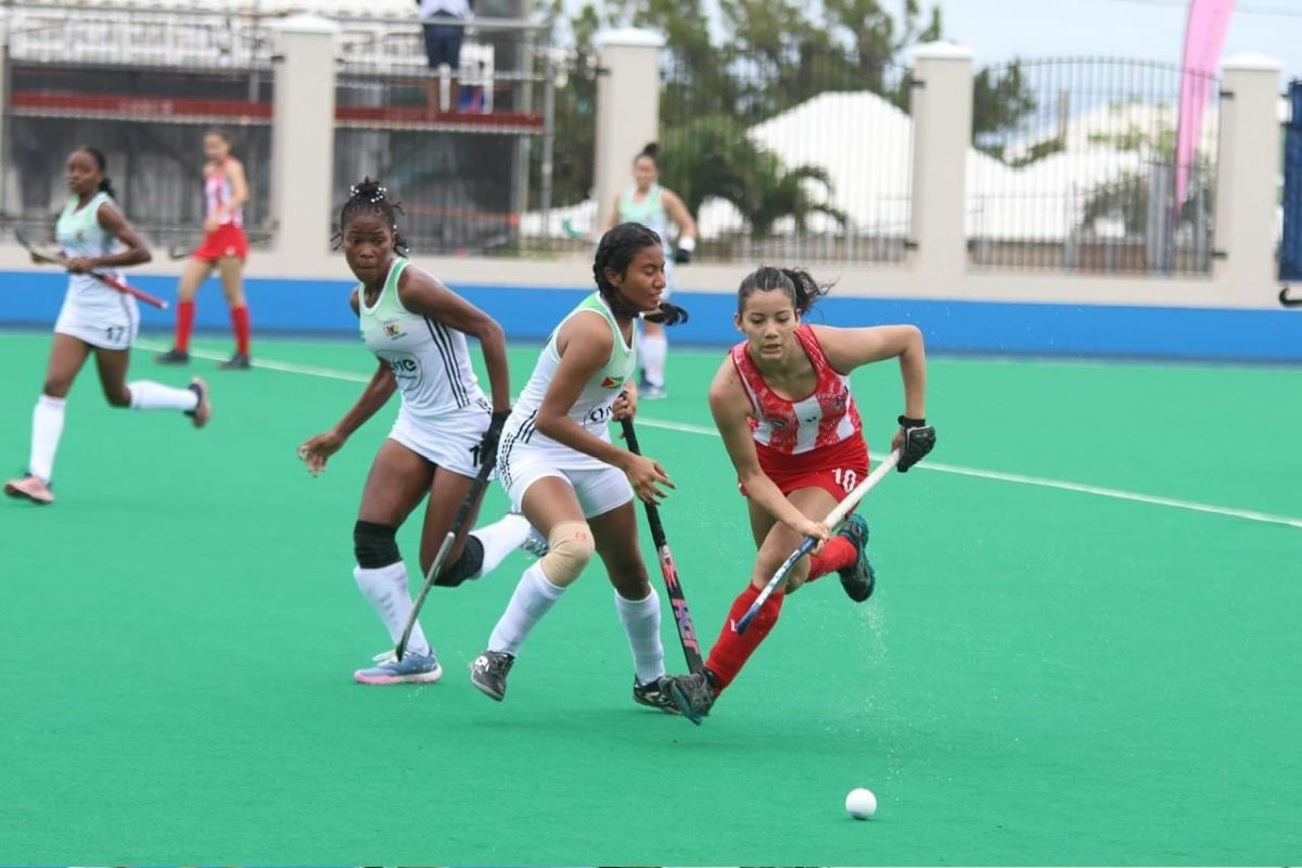 Action between Guyana and Paraguay in the group stage of the Pan Am Hockey Challenge