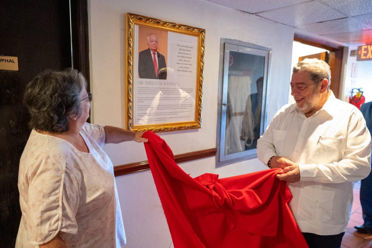  The Pegasus Hotel yesterday unveiled a tribute to Sir Shridath Ramphal in the suite which had been named after him over 12 years ago. The unveiling of the tribute was done by his daughter Susan Sanders (left) and Prime Minister of St Vincent and the Grenadines, Ralph Gonsalves. The suite is situated next to the Queen Elizabeth Suite. Sir Shridath died on August 30th at the age of 95 in Barbados. His cremated remains were interred on Saturday at the Place of the Seven Ponds in the Botanical Garden.
