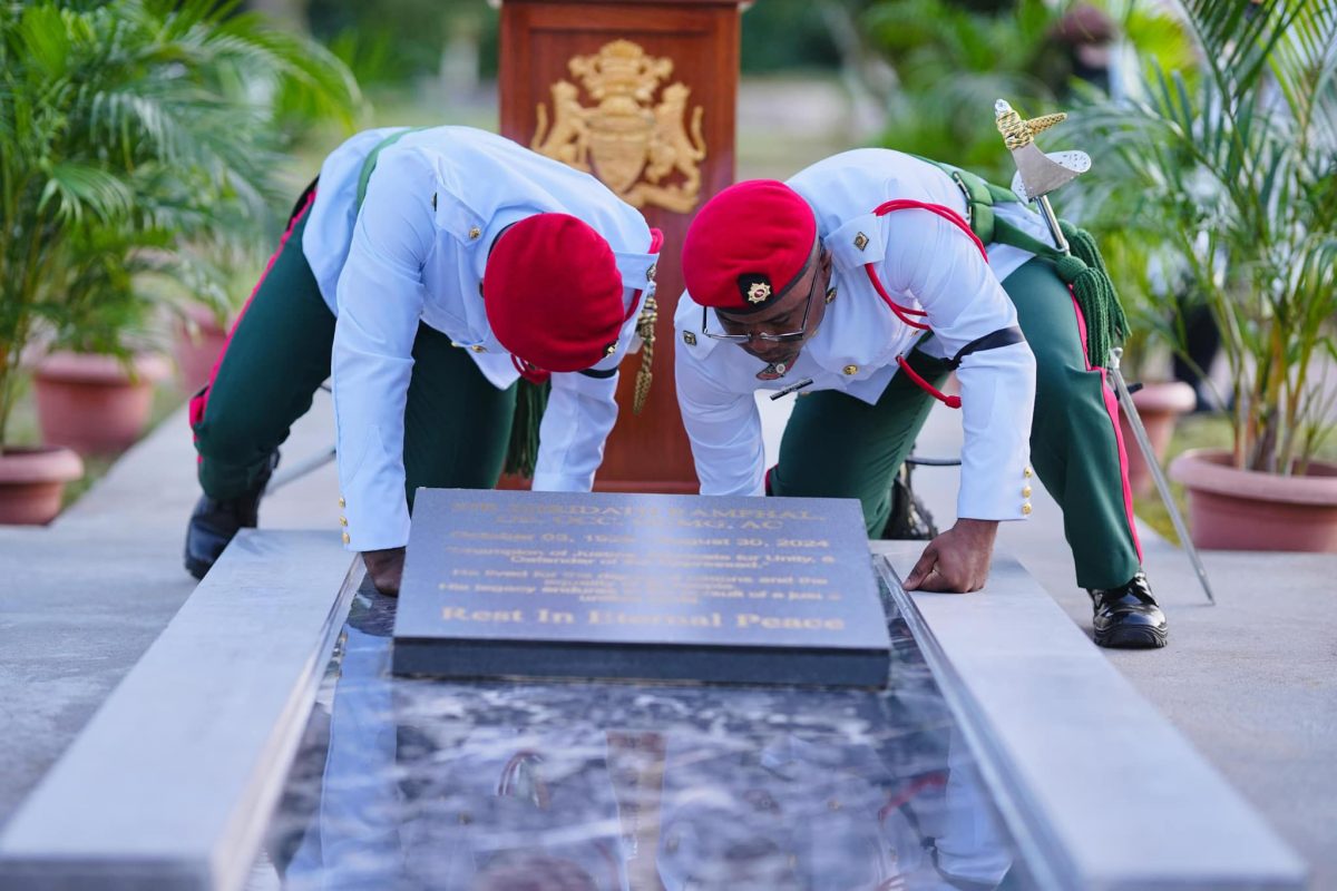 The remains of Sir Shridath Ramphal being interred at the Place of the Seven Ponds, Botanic Gardens (President Irfaan Ali’s Facebook page)