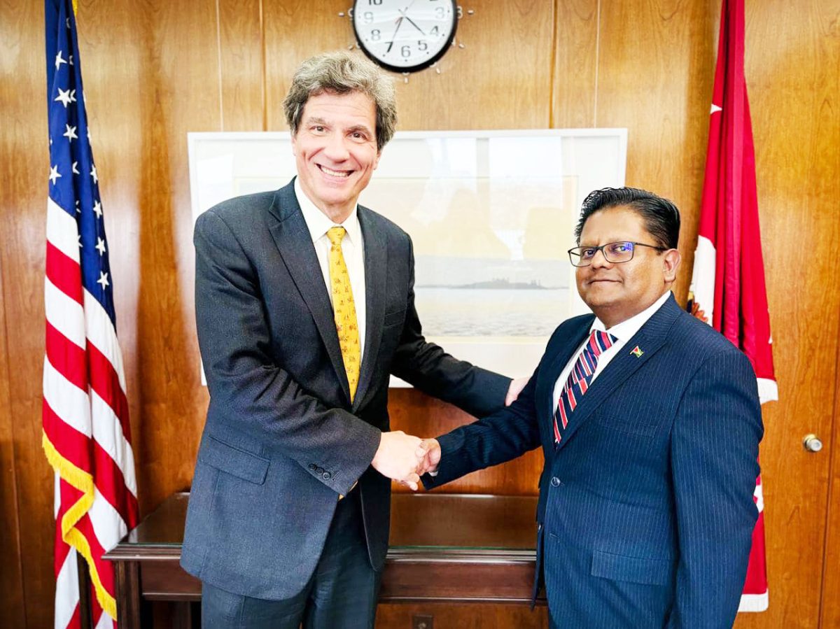 Finance Minister Dr Ashni Singh (right) met with the United States Under Secretary of State for Economic Growth, Energy, and the Environment, Jose W. Fernandez. (Ministry of Finance photo)