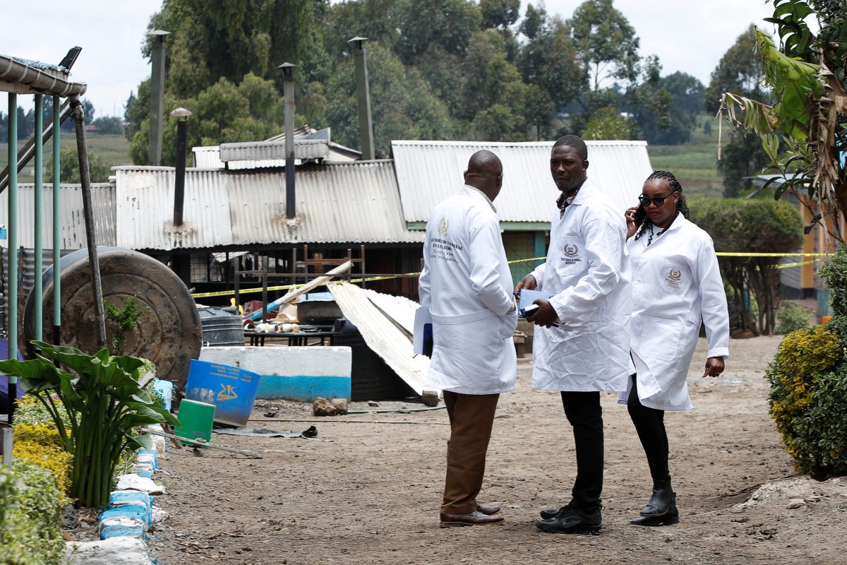 Directorate of Criminal Investigations (DCI) officers work at the Hillside Endarasha Academy, following a fatal fire which killed and injured several pupils, in Kieni, Nyeri County, Kenya, September 6, 2024. REUTERS/Monicah Mwangi