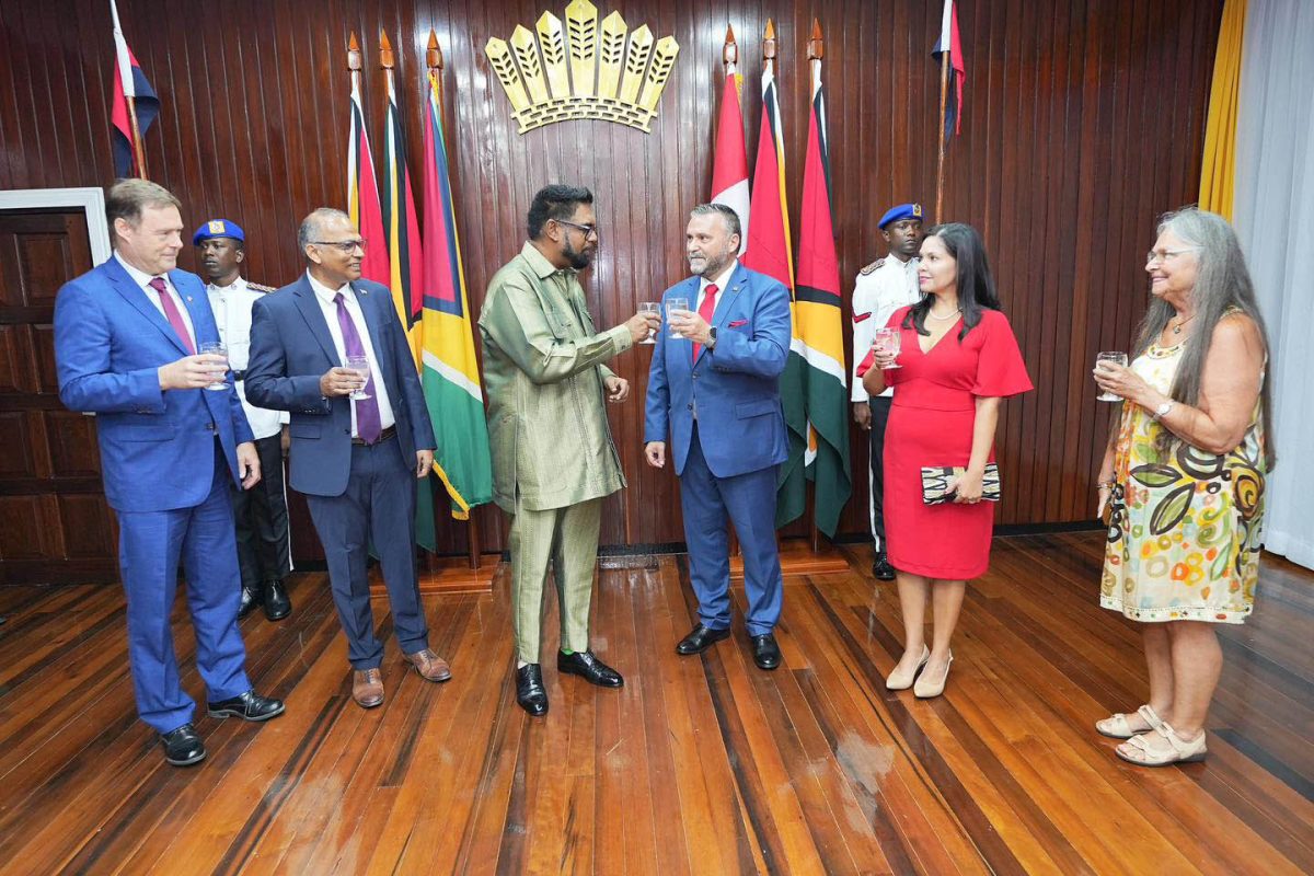 Canada’s new High Commissioner to Guyana Sebastien Sigouin (third from right) sharing a toast with President Irfaan Ali yesterday after the accreditation ceremony. (Office of the President photo)