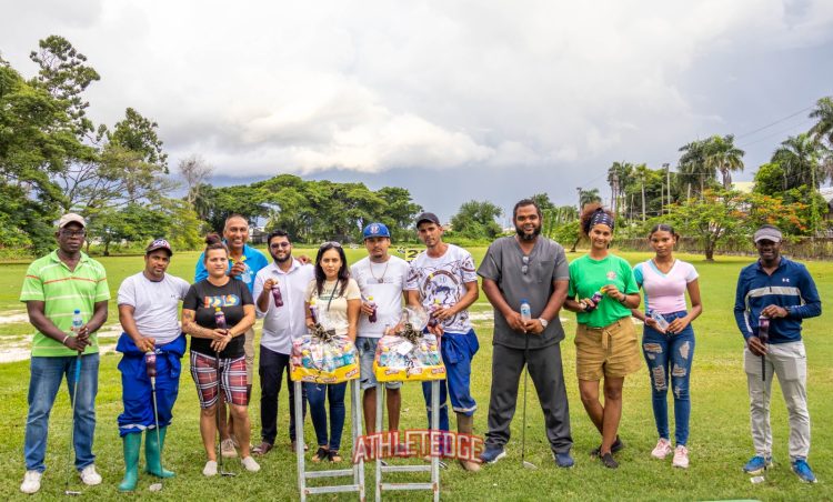 The various winners of the Nexgen Hole-in-One Challenge posed with their prizes.