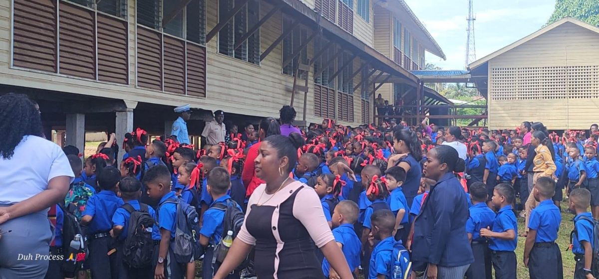 Using the road safely:  With schools reopening yesterday, a lecture was done by Traffic Officer Regional Police Division #1, Inspector M. Craig and Subordinate Officer in-charge of Traffic, Port Kaituma Police Station, Sergeant Schultz at the Port Kaituma Primary School. (Police photo)
