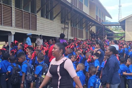 Using the road safely:  With schools reopening yesterday, a lecture was done by Traffic Officer Regional Police Division #1, Inspector M. Craig and Subordinate Officer in-charge of Traffic, Port Kaituma Police Station, Sergeant Schultz at the Port Kaituma Primary School. (Police photo)
