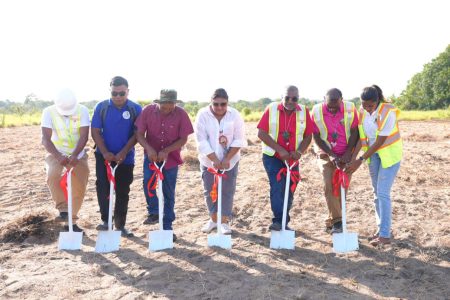 Minister of Education Priya Manickchand (fourth from left) at the sod turning (Ministry of Education photo)