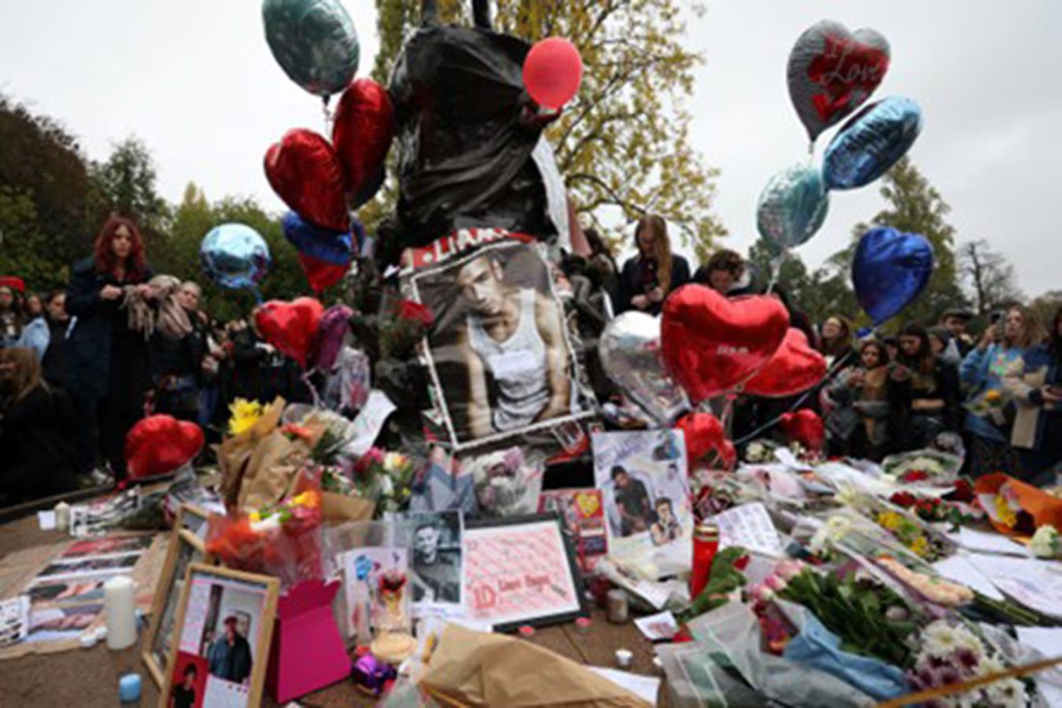 Fans gather to pay tribute to former One Direction singer Liam Payne, who was found dead after he fell from a third-floor hotel room balcony in Buenos Aires, 