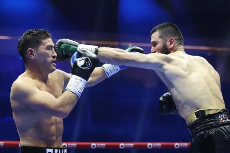 Artur Beterbiev (right) lands a left jab to the head of Dmitry Bivol en route to his majority points decision victory
