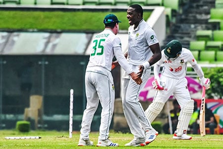 Kagiso Rabada celebrates after bowling Mushfiqur Rahim for 11 en route to passing the 300 test wicket mark (ESPN Cricinfo Photo).