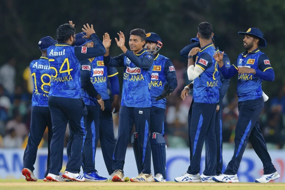 Debutant Dunith Wellalage (centre) is congratulated by teammates after dismissing Roston Chase for 0 (ESPN Cricinfo Photo)