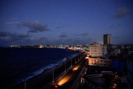 Cars drive on Havana’s seafront boulevard Malecon as the country’s electrical grid collapsed again on Sunday, according to Cuba’s energy and mines ministry, in the latest setback to the government’s efforts to restore power to the island, in Havana, Cuba October 20, 2024.