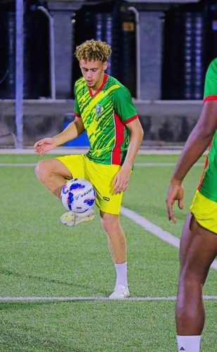 Stephen Duke-McKenna participating in a passing drill during a training
session at the National Track and
Field Centre, Leonora