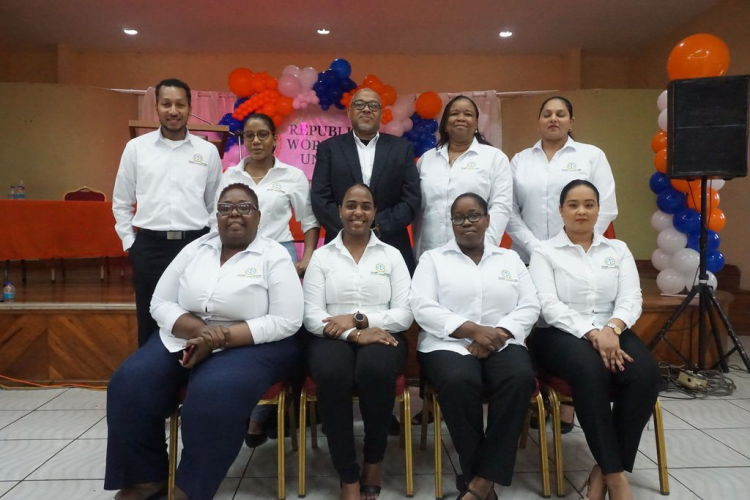 Republic Workers Union President General Jason Thomas, centre, with members at the launch at St Augustine South Community Centre, Freeman Road, yesterday.KERWIN PIERRE