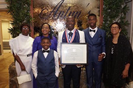 Dr Keith Cummings with his family; flanking him from left are: his mom Florence, wife Shafisha, son Elijah, son Emmanuel and mother-in-law Ingrid. 