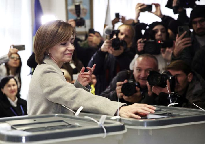 Moldova’s incumbent President and presidential candidate Maia Sandu casts her ballots at a polling station, as the country holds a presidential election and a referendum on joining the European Union, in Chisinau, Moldova October 20, 2024.