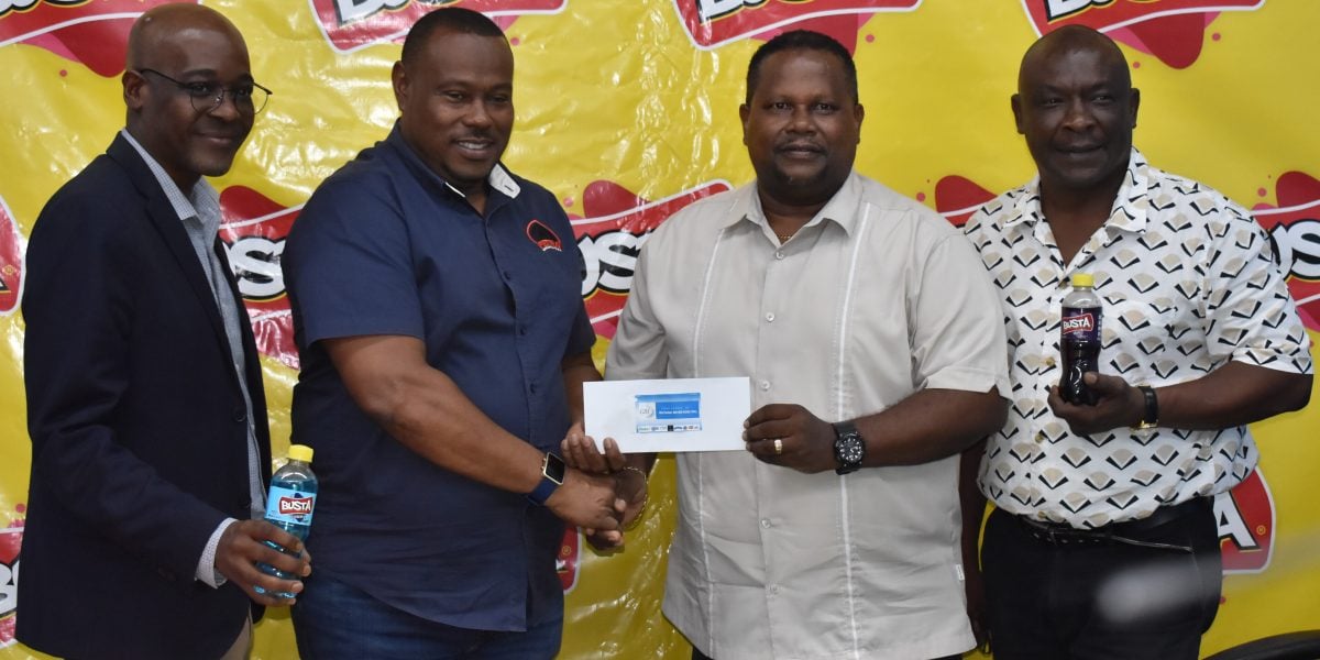 Petra Organisation Co-Director Troy Mendonca (2nd from left) receives the sponsorship agreement from Samuel Arjune, GBI Marketing Manager, in the presence of Andre Noel (left), Group Customer Marketing Manager of GBI parent company, S.M. Jaleel, and Troy Peters.