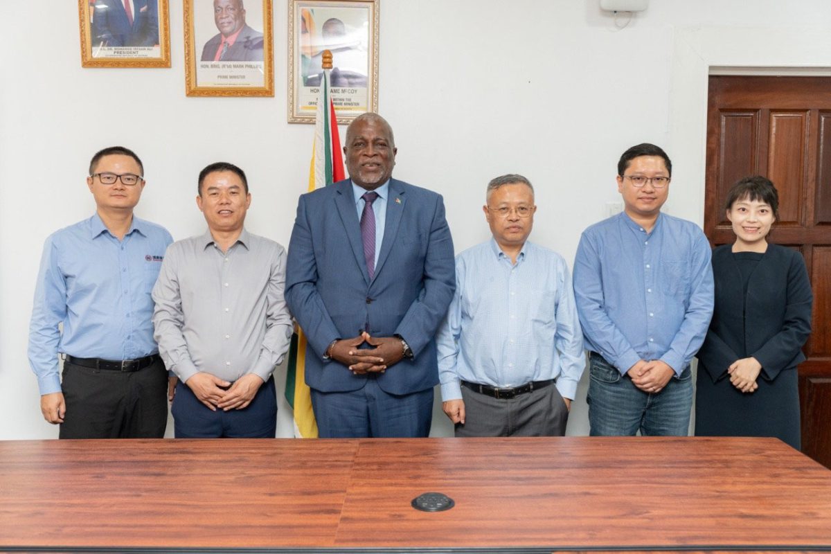 Prime Minister Mark Phillips (third from left) with Bosai officials (Office of the Prime Minister photo)