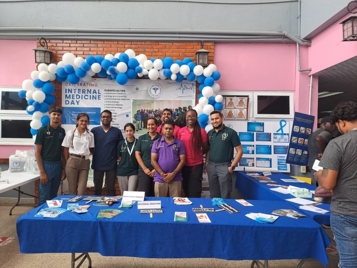 Consultant Specialist Dr Kishore Ramdass along with staff at the mini expo 