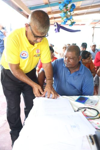 An applicant being fingerprinted (CH&PA photo)
