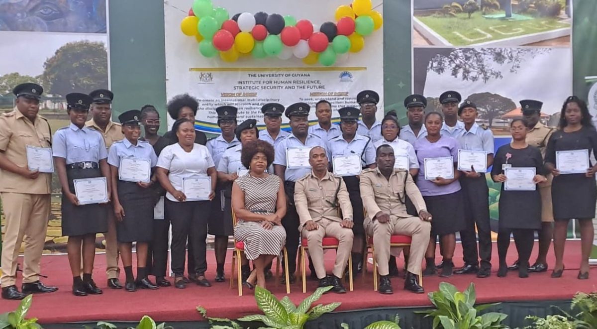 The first batch of 60 prison officers who completed the University of Guyana’s Institute for Human Resiliency, Strategic Security, and the Future (IHRSSF) First Responders Course on Mental, Neurological, and Substance Abuse Disorders (MNS), received their certificate of completion on Wednesday. The proud officers are seen with senior prison officers, including Director of Prison Nicklon Elliot, and other officials. (Guyana Prison Service photo)