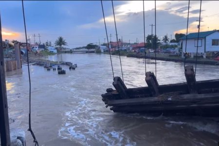 The middle door of the koker at Canal Number One, West Bank Demerara  failed  yesterday under the pressure of the high tide. The National Drainage and Irrigation Authority yesterday moved to install stop logs.  The site was visited by President Irfaan Ali yesterday. (Irfaan Ali Facebook page)