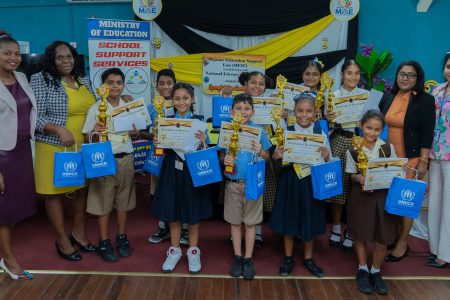 Some of the winners with their trophies and certificates (Ministry of Education photo)
