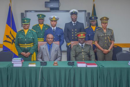 Lt Col Loyd Souvenir is seated at right. (GDF photo)