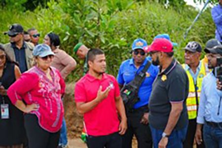 White Water Toshao, Andrew Cox giving President Ali an update on the road project