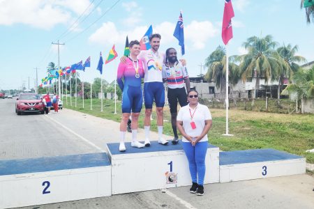 (From left): Senior Men’s Open silver medallist Kaden Hopkins (Bermuda), gold medallist Conor White (Bermuda), and bronze medallist Cory Williams (Belize) posed for a photo opportunity with GCF’s Denise Hopkinson.