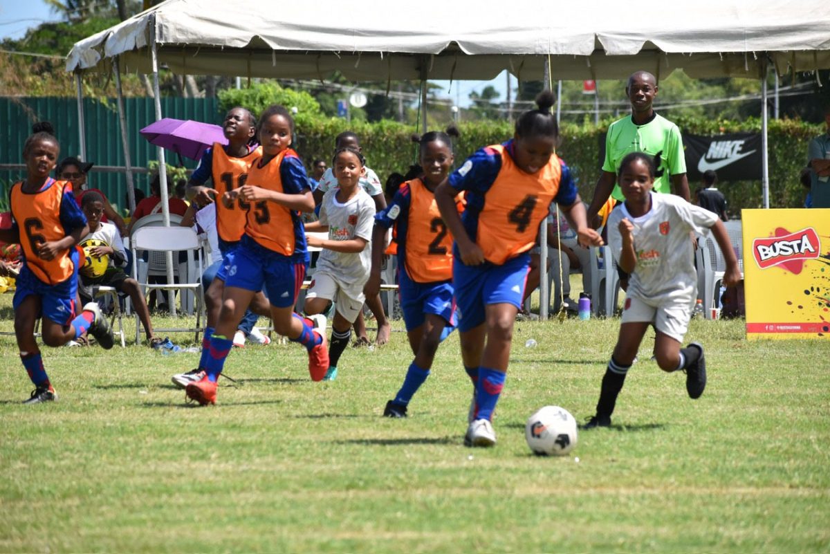 Action between Smith Memorial (orange) and Potaro Strikers at the Ministry of Education ground.