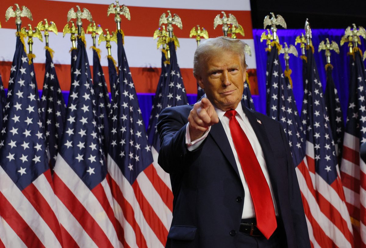 Republican presidential nominee and former U.S. President Donald Trump takes the stage to address supporters at his rally, at the Palm Beach County Convention Center in West Palm Beach, Florida, U.S., November 6, 2024. REUTERS/Brian Snyder