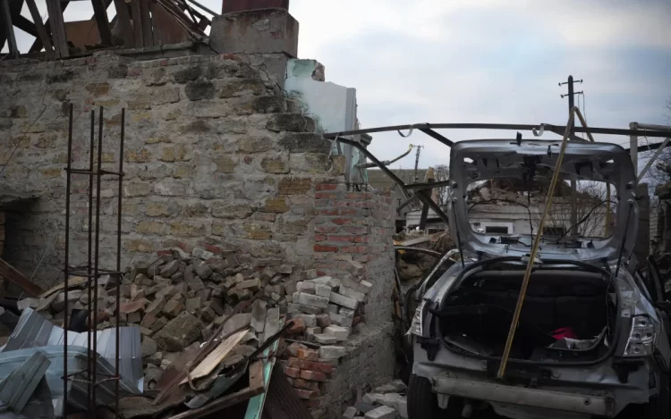 A car and buildings destroyed as the result of a drone attack in Mykolaiv, Ukraine. Photo: Supplied / Ukrainian Emergency Service