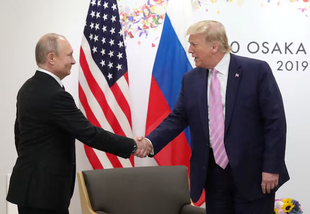 Russia’s President Vladimir Putin shakes hands with U.S. President Donald Trump during a meeting on the sidelines of the G20 summit in Osaka, Japan June 28, 2019.