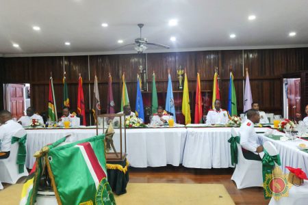 Brigadier Godfrey Bess (third from left) at head table (GDF photo)
