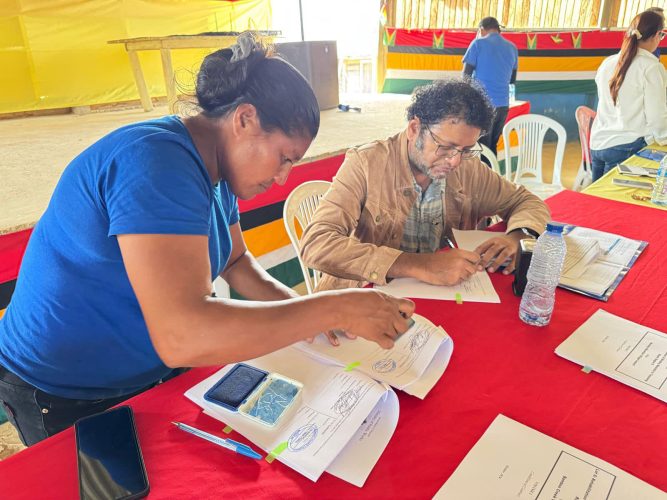 One of the contracts being signed (Ministry of Public Works photo)