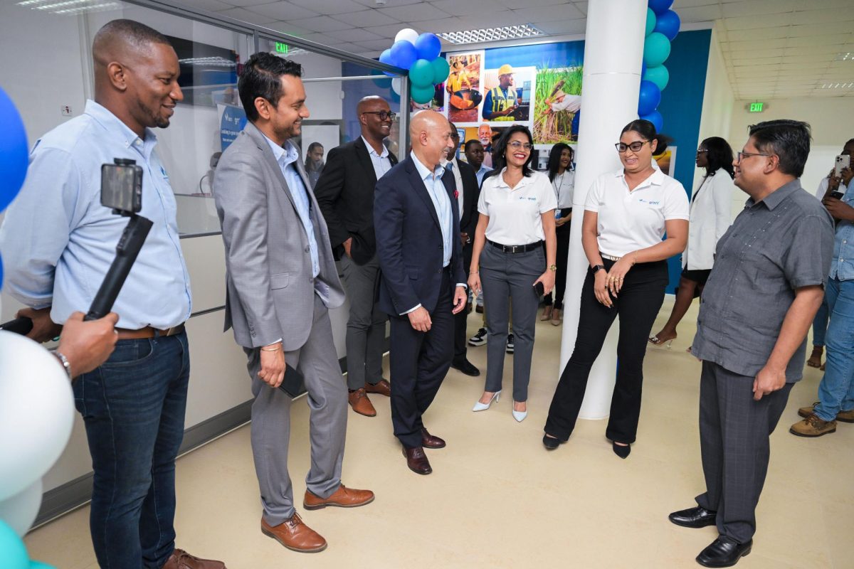 Finance Minister Dr Ashni Singh (right) at the launch. Chief Executive Officer of GBTI, Shawn Gurcharran is second from left  (GBTI photo) 