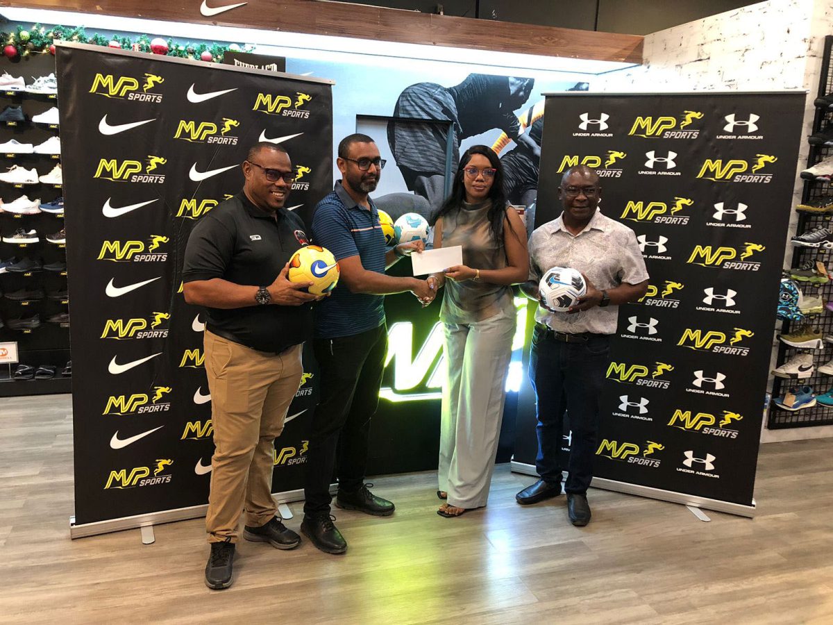 Petra Organisation
representative Aaliyah Hinds (second from right) receives the sponsorship cheque from MVP Sports Proprietor Ian Ramdeo in the presence of Petra Organisation
Co-Director Troy Mendonca (left) and Troy Peters
