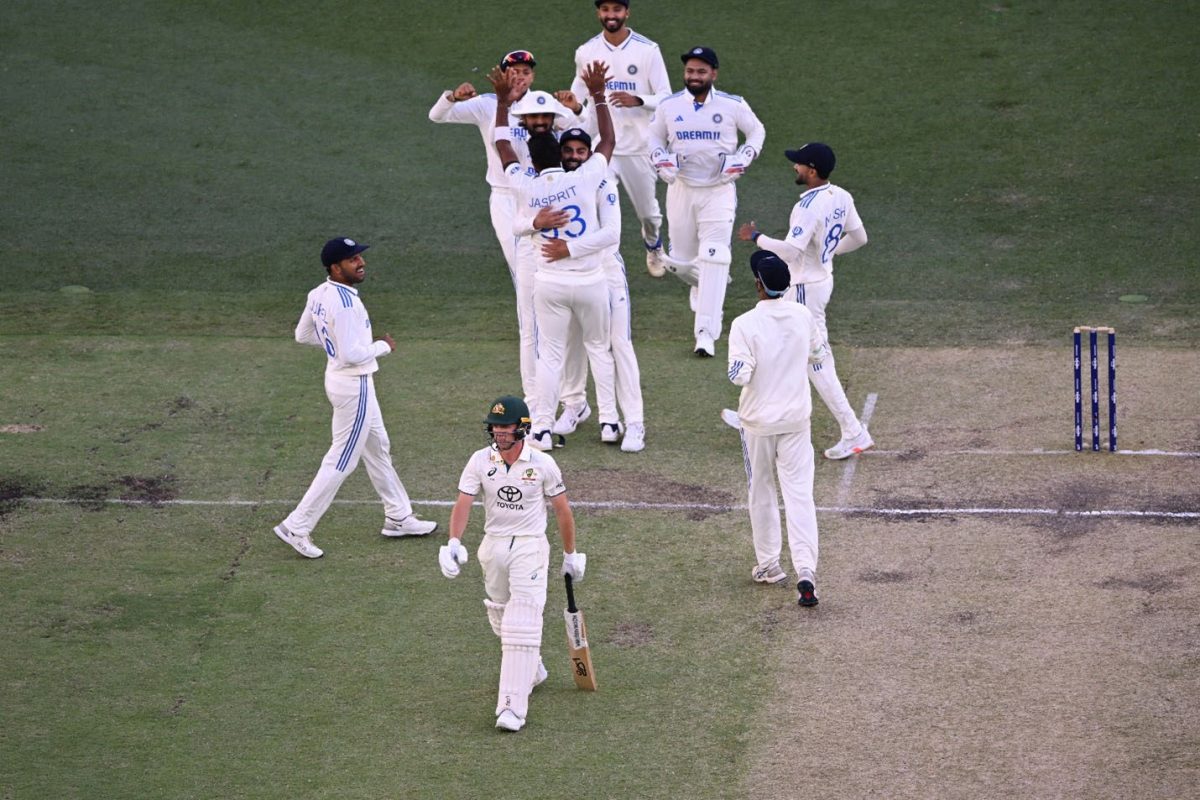  India's Jasprit Bumrah celebrates with teammates after taking the lbw wicket of Australia's Nathan McSweeney Dean Lewins/AAP Image via REUTERS