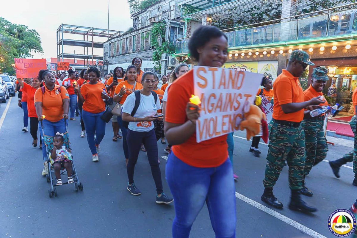  A walk was held yesterday from the Bank of Guyana to the Seawall Bandstand and the walkers donned orange to bring awareness to gender-based violence.  This was part of 16 days of activism on the problem. (Ministry of Human Services photo)