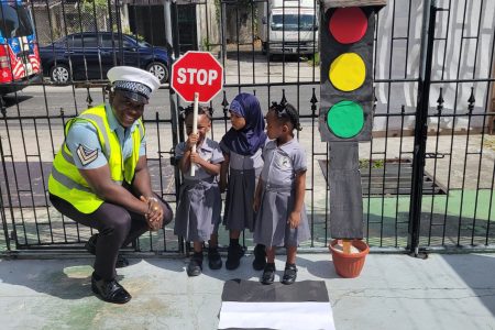 Yesterday between 9 am and 9.25 am a Lecture to School was done by Corporal Roberts of Traffic Headquarters at the Harpy Eagle Nursey School in Georgetown. (Police photo) 