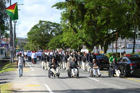 Commander-in-Chief of the Armed Forces, President Irfaan Ali, was joined by Prime Minister Brigadier Mark Phillips, Chief of Defence Staff Brigadier Omar Khan of the Guyana Defence Force, other heads of the Joint Services, and members of the diplomatic community at the War Monument outside the Bank of Guyana to pay tribute to the fallen heroes of World War I and World War II. In this photograph war veterans are seen making their way to the monument. (Office of the President photo)