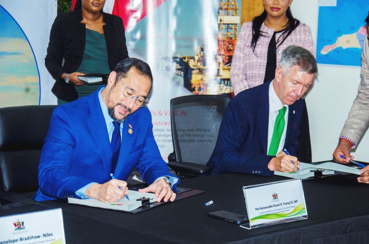 L to R: Stuart R. Young SC MP, Minister of Energy and Energy Industries and Minister in the Office of the Prime Minister; and David Campbell, President of bpTT, at the signing of the Production Sharing Contract (PSC) for Block NCMA 2, on Tuesday 19 November 2024. [Image courtesy Ministry of Energy and Energy Industries]