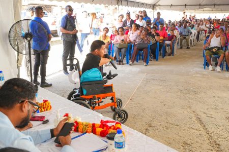 A member of the public speaking yesterday during President Irfaan Ali’s outreach to the Essequibo Coast. (Irfaan Ali Facebook page) 